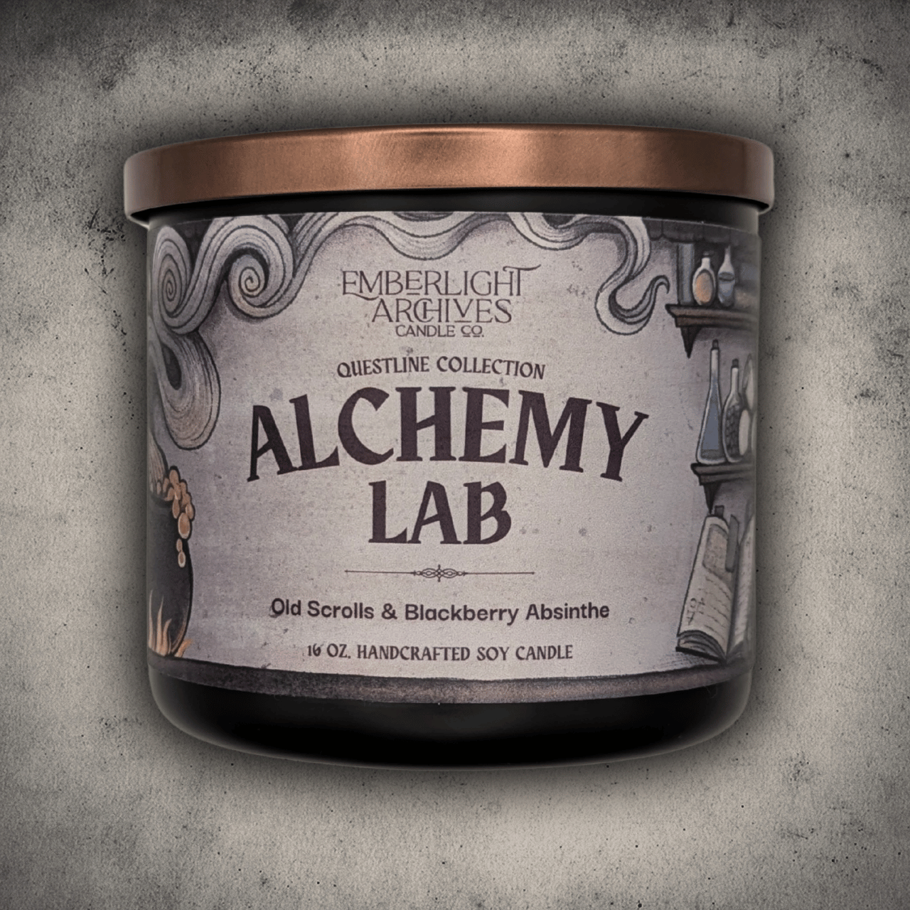 Emberlight Archives Alchemy Lab candle in a 16oz black glass jar with illustrated scrolls and potions label against a gray stone background, Old Scrolls and Blackberry Absinthe scent.